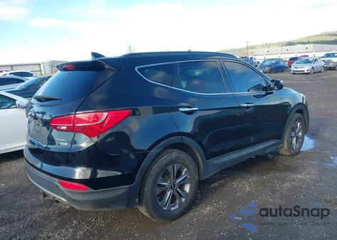 2015 Hyundai Santa Fe Sport 2.4L z USA, uszkodzony, nr VIN 5XYZUDLB0FG244699
